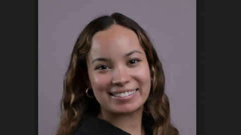 Image of a headshot of Lauren Leitzelar, wearing a black blouse. Courtesy of Lauren Leitzelar.